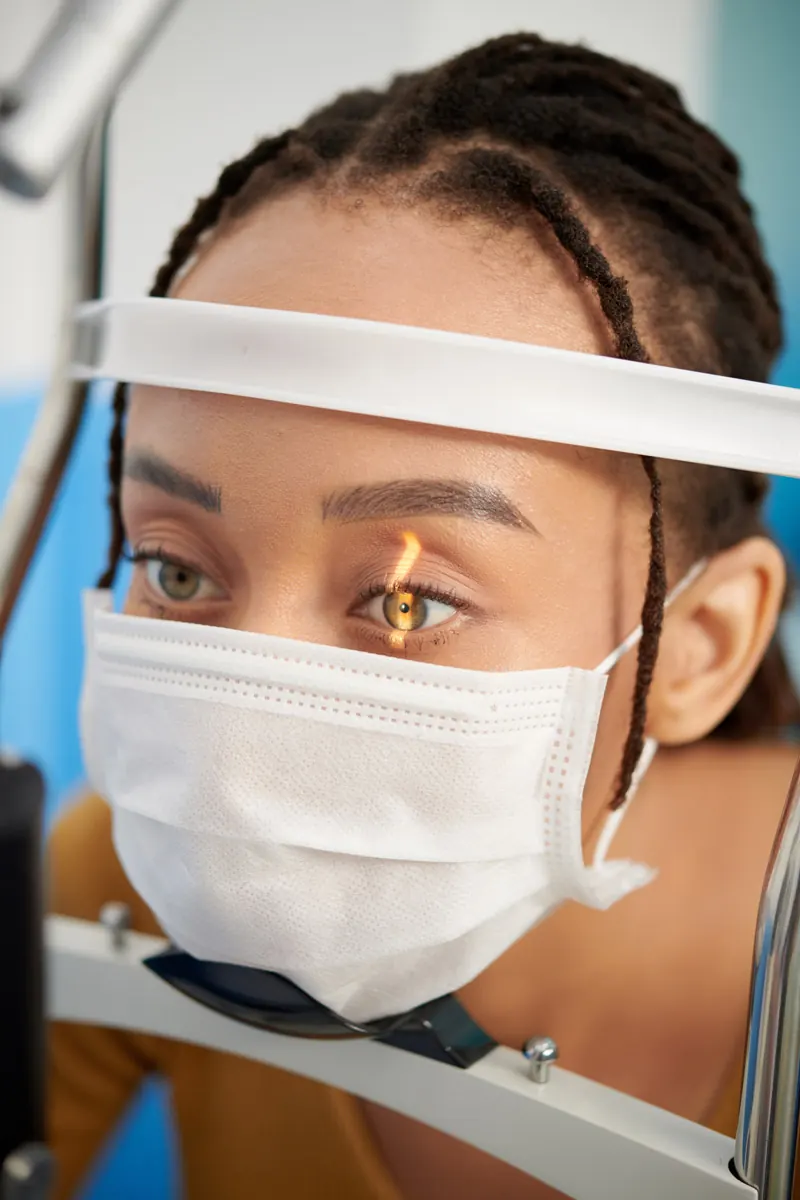 Patient receiving a comprehensive eye exam